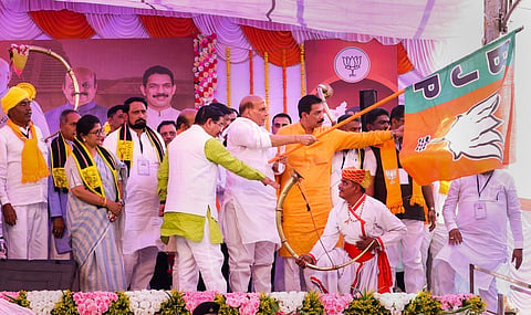 Defence Minister and senior BJP leader Rajnath Singh with Prahlad Joshi, Karnataka BJP President Nalin Kumar Kateel and other party leaders during the 'Vijay Sankalp Yatra', at Nandgad. (PTI)