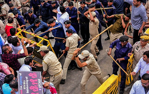 Police personnel lathi charge during a protest by doctors against Rajasthan's Right to Health Bill in Jaipur,  March 20, 2023. (Photo | PTI)