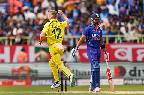 Australian bowler Nathan Ellis celebrates the wicket of Indian batter Virat Kohli during the second ODI, March 19, 2023. (Photo | PTI)