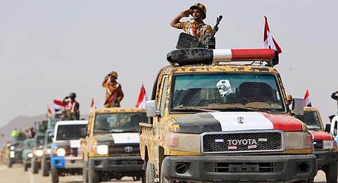 This March 2023 image shows fighters loyal to Yemen's Saudi-backed government taking part in a military parade marking the 56th anniversary of the 1962 revolution. (Photo | AFP)