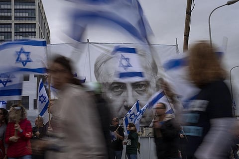 Israel Prime Minister Benjamin Netanyahu paused a controversial judicial overhaul plan on Monday that had set off unprecedented street protests and a spiraling domestic crisis. Three months of demonstrations against the overhaul plan had intensified this 