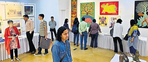 Visitors at CIMA Art Mela in Delhi.