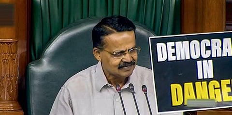 BJD's Bhartruhari Mahtab conducts proceedings in the Lok Sabha amid a protest by opposition MPs during the Budget Session of Parliament, March 29, 2023. (Photo |PTI)