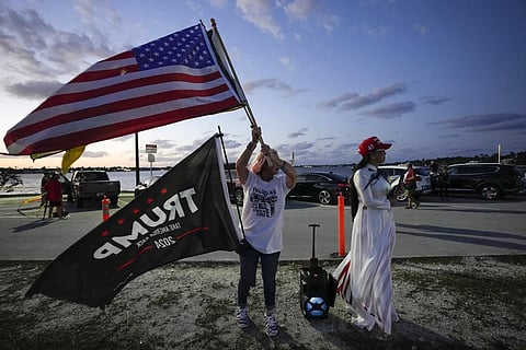 People  show their support for former President Donald Trump after the news broke that Trump has been indicted by a Manhattan grand jury, Thursday, March 30 (Photo | AP)