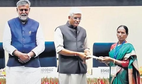 Union Water Resources Minister Gajendra Singh Shekhawat felicitating Tellam Venkayamma in New Delhi on Saturday | Express