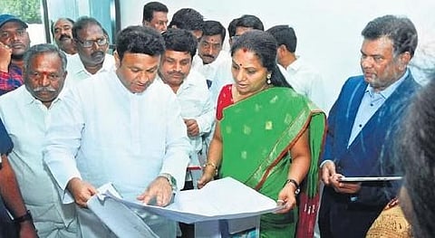​  MLC K Kavitha along with BRS leaders and officials examines the blueprint of the IT-Hub in Nizamabad on Saturday   ​