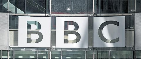 BBC logo at the entrance of the BBC headquarters at Broadcasting House in London. (File Photo | AFP)