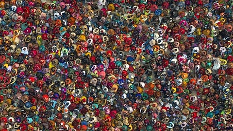 FILE - Hindu devotees listen to a religious leader at the Sangam, during the annual traditional fair of Magh Mela festival, in Prayagraj, in Uttar Pradesh, Jan. 31, 2023. (Photo | AP)