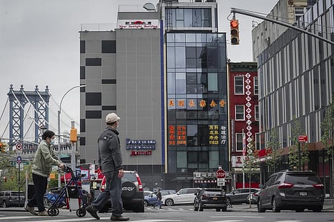 A six story glass facade building, center, is believed to be the site of a foreign police outpost for China in New York's Chinatown, Monday, April 17, 2023. (Photo | AP)