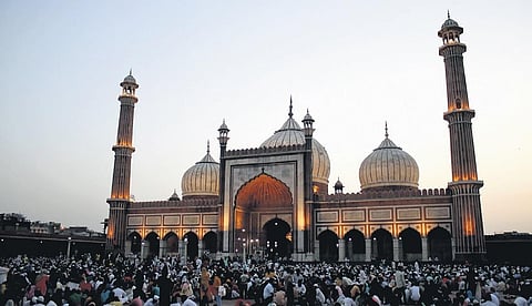 People  outside Jama Masjid as they break fast.