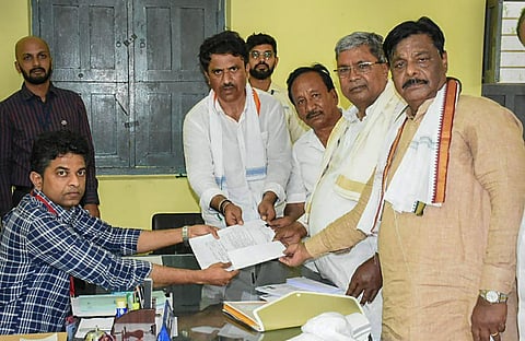 Senior Congress leader Siddaramaiah files his nomination papers ahead of the Karnataka Assembly elections, in Varuna in Mysuru district, on April 19, 2023. (Photo | PTI)