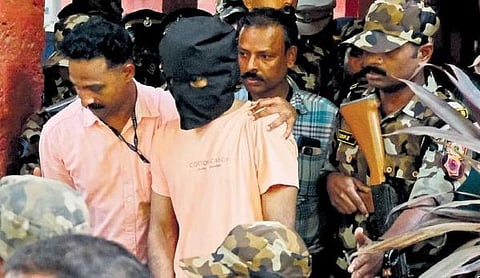 ​  Elathur train attack accused Shahrukh Saifi being brought out of the court in Kozhikode on Tuesday | Express  ​