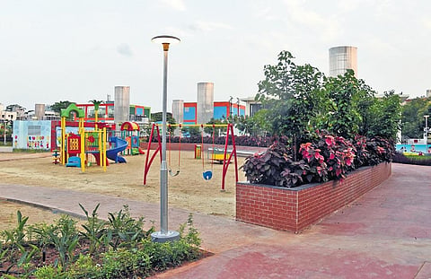 The park, originally spread over 8.5 acres, will now have fewer trees as around 130 out of 300 trees were cut down for constructing the metro rail station. (Photo | Martin Louis, EPS)