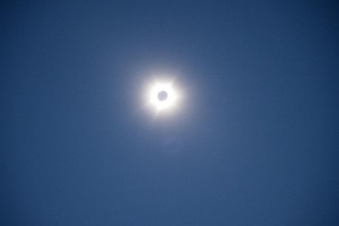 The sun and moon are photographed near Exmouth, Australia, during a solar eclipse on Thursday, April 20, 2023. (Photo | AP)