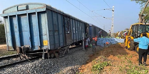Restoration work has begun with the unloading of fertiliser bags from the derailed goods train. (Photo | EPS)