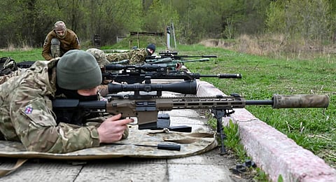Servicemen belonging to the assault brigade 'Spartan' of National Guard of Ukraine, take part in military exercises in Kharkiv. (Photo | AFP)