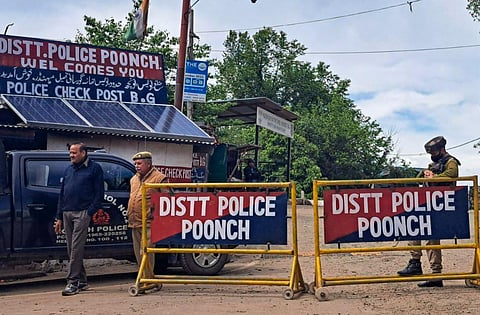 Security personnel at a police blockade at Bhimber Gali sector, near the site of the terror attack in which five army personnel were killed, in Poonch district. (Photo | PTI)