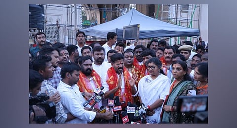 TPCC president A Revanth Reddy speaks to the media in front of the Bhagyalakshmi temple near Charminar in Hyderabad on Saturday