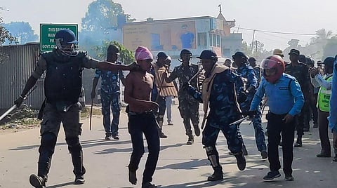 Security personnel try to control the situation after violent protests by locals over the death of a minor girl, in North Dinajpur district of West Bengal, on April 22, 2023. (Photo | PTI)