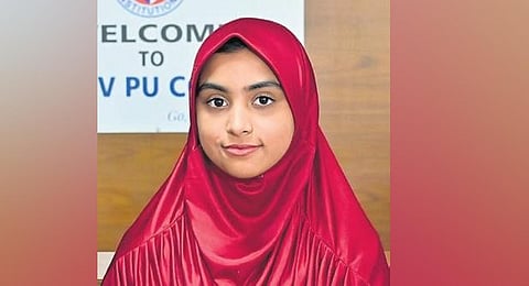 Tabassum Shaik, who topped the arts stream in the Second Pre-University (PU) exams, scoring an astounding 593 out of 600. (Photo | Express)