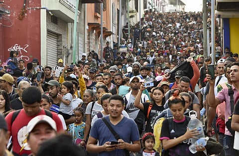 Migrants start walking north on their way to Mexico City from Tapachula, Chiapas state, Mexico, Sunday, April 23, 2023. (Photo | AP)