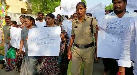 Mayor P Sravanthi, along with a faction of the YSRC supporting the suspended MLA Kotamreddy Sridhar Reddy, taking out a rally in the town on Monday  I Express