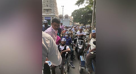 Differently-abled persons participate in AAP’s campaign in Bengaluru on Wednesday. (Photo | Express)