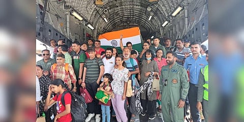 People evacuated from Sudan express their joy after landing in Mumbai. (Photo | Twitter)
