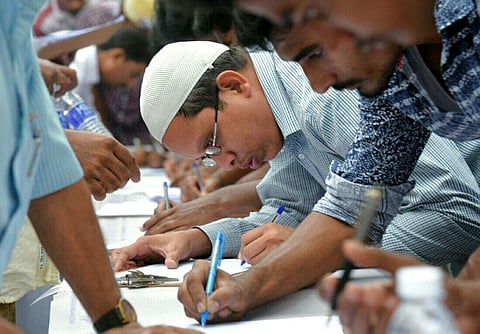 A file photo of Muslims at a signature campaign in all jamath mosque across Coimbatore in Tamil Nadu against the Centre's proposal to implement Uniform Civil Code. (Photo | EPS)