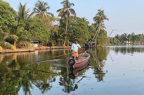 A man travels by boat from one district to another to help people get clean water in Kochi, Kerala, India, on Wednesday, March 1, 2023. (File Photo | PTI)