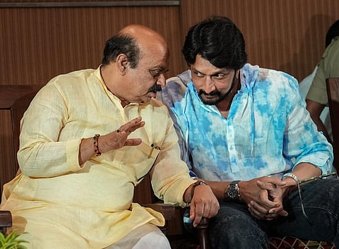 Karnataka Chief Minister Basavaraj Bommai with Kannada actor Kiccha Sudeep during a press conference in Bengaluru, April 5, 2023. (Photo | PTI)
