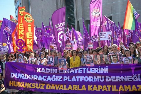 Protesters waved banners bearing slogans such as 'You will never walk alone!' outside the court Wednesday. (Photo | AFP)