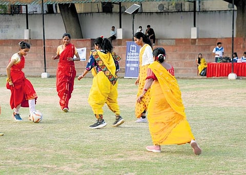 Representational Image: Women clad in sarees play in a two-day football tournamnet in Gwalior| Express