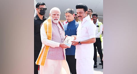 CM MK Stalin presented a book titled  'Gandhi's Travels in Tamil Nadu' to PM when the latter arrived at Chennai airport today