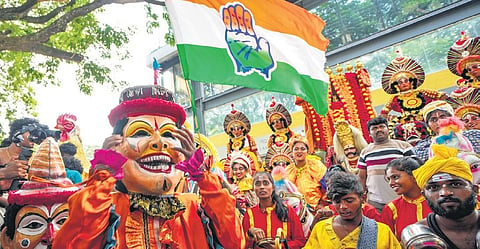 Folk artistes perform during Congress’s celebrations after the party’s win in Assembly elections in Bengaluru on Saturday. (Photo | PTI)