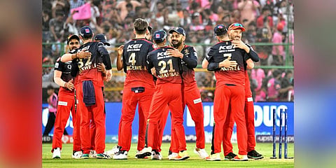 Royal Challengers Bangalore players celebrate after winning their IPL 2023 cricket match against Rajasthan Royals, at Sawai Mansingh Stadium in Jaipur. (Photo | PTI)