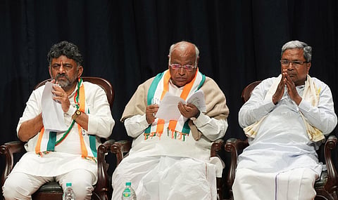 Congress President Mallikarjun Kharge with former Karnataka CM Siddaramaiah and KPCC chief DK Shivakumar in Bengaluru. (Photo | PTI)