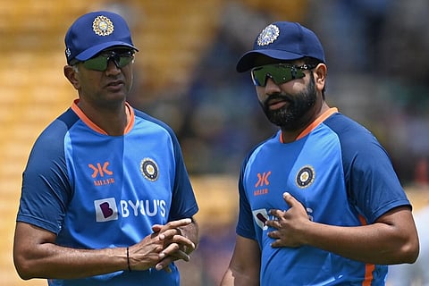 Indian cricket team captain Rohit Sharma (R) and head coach Rahul Dravid