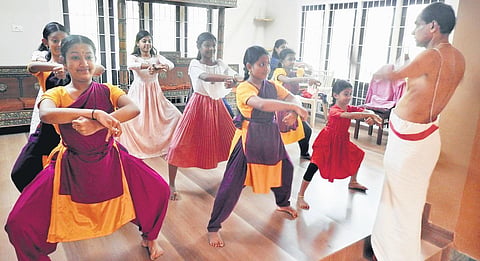 Kalamandalam Venkitaraman teaching girl students kathakali in Kallekulangara, on the outskirts of Palakkad town