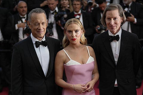 Tom Hanks, from left, Scarlett Johansson, and director Wes Anderson at the premiere of the film 'Asteroid City' at the 76th international film festival, Cannes. (Photo | AP)