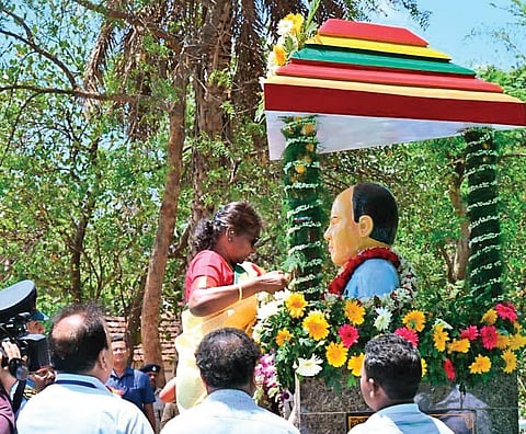 President Droupadi Murmu garlanding the statue of her late husband | Express