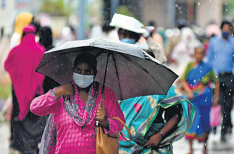Citizens witnessed a sudden downpour in Vijayawada on Friday | Prasant Madugula