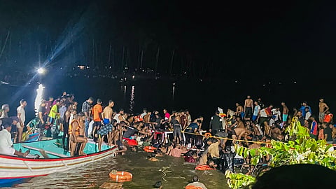 Over twenty people, including women and children, were killed when a houseboat with more than 30 passengers on board capsized and sank near the Thoovaltheeram beach in the Tanur area of Kerala's Malappuram district on May 7. (Photo | PTI)