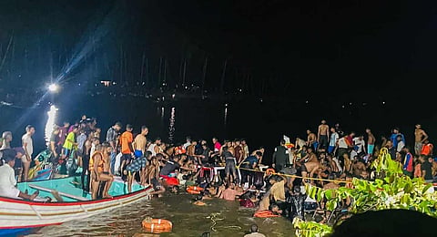 Rescue operation underway after a boat sank near Tuvalthiram beach, at Tanur area of Malappuram district. (Photo | PTI)