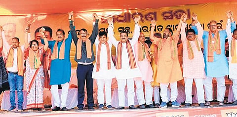 Union Minister Dharmendra Pradhan along with BJP candidate Tankadhar Tripathy and other leaders at a public rally in Jharsuguda on Sunday | Express