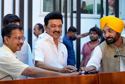 Tamil Nadu CM MK Stalin, with Delhi CM Arvind Kejriwal (L) and Punjab CM Bhagwant Mann (R), addresses the media after their meeting at his residence, in Chennai, Thursday, June 1, 2023. (Photo | PTI)
