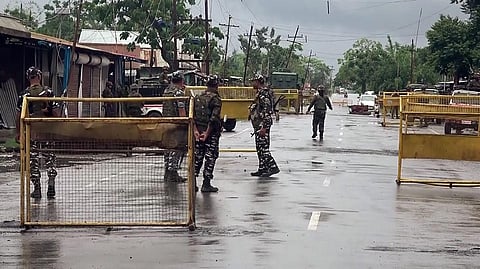Heavy police force deployed after violence occurred in several areas of Manipur, on Sunday. (Photo | ANI)