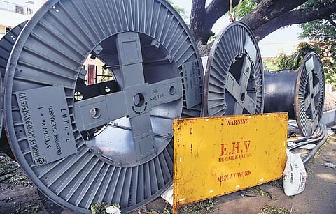 High voltage cables near a working site on New Avadi Road | p ravikumar