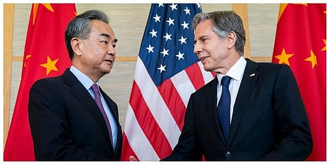 FILE - US Secretary of State Antony Blinken (R) shakes hands with former Chinese Foreign Minister Wang Yi. (Photo | AP)
