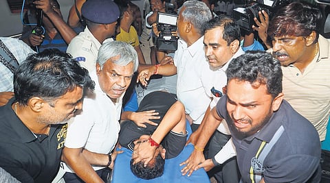 Electricity Minister V Senthil Balaji cries in pain while being taken to a government hospital after his arrest by the ED in Chennai late on Tuesday| Express